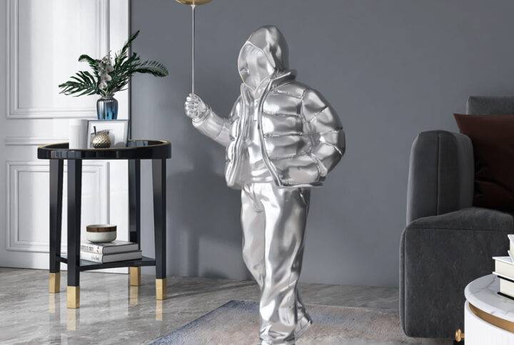 Remarkable Balloon Boy Sculpture