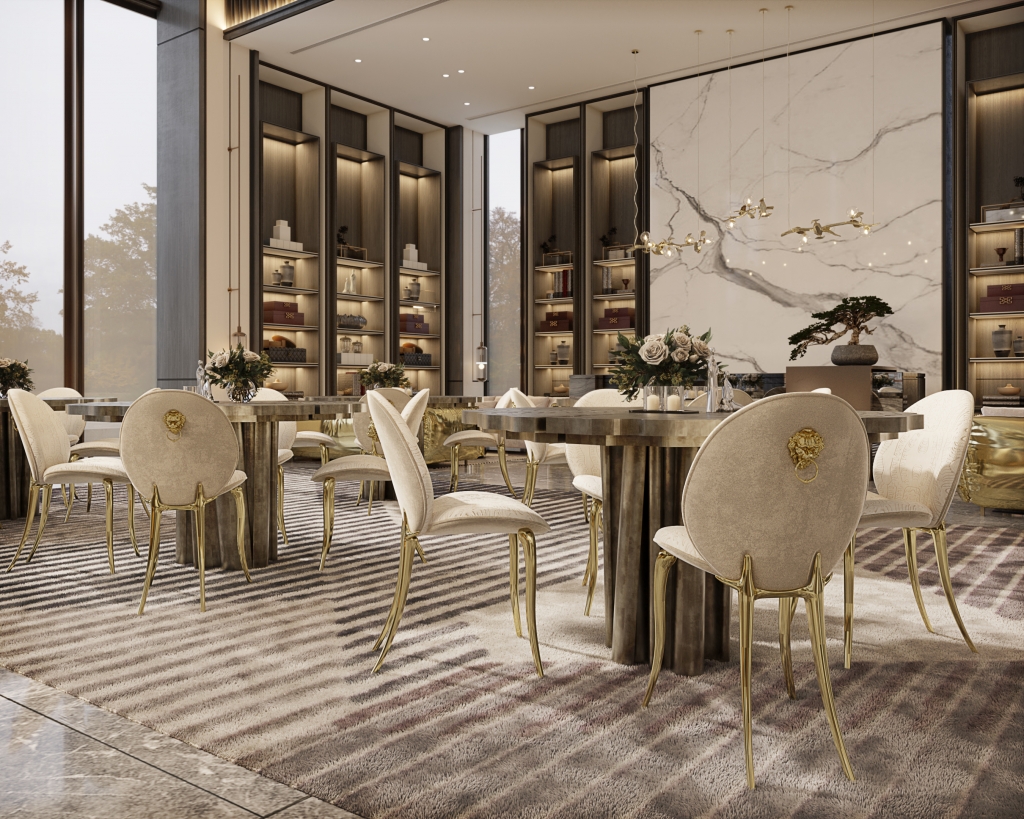 A Deep Dive into Artistry and Details 59 Details: Opulent SOLEIL CREAM CHAIR from Boca do Lobo, featuring plush cream upholstery and intricate carvings with gold leaf accents.